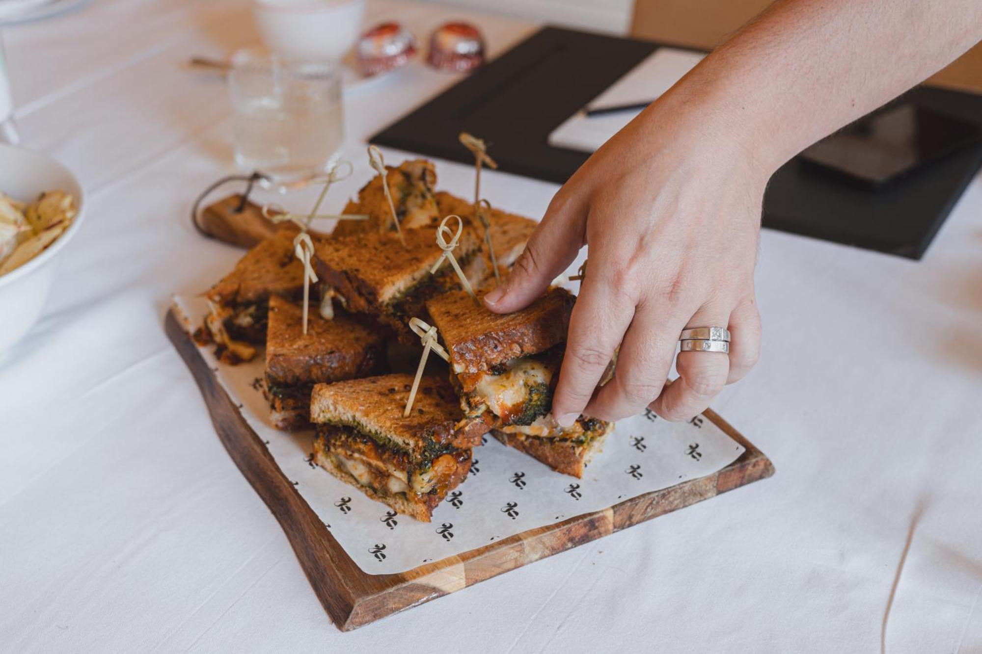 No 15 By Guesthouse, Bath Luaran gambar A hand picking up a canapé